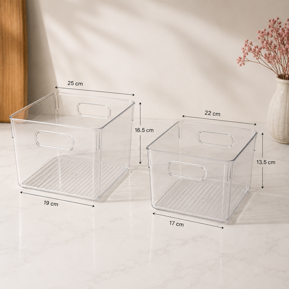 Clear storage bins with handles showing dimensions for both sizes