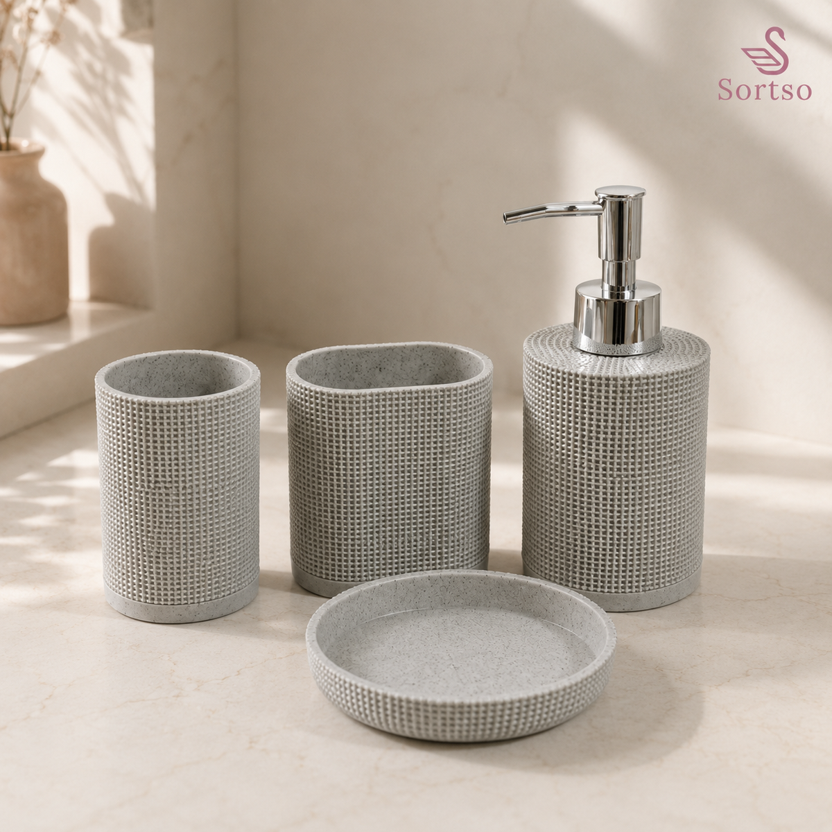 4-piece grey resin bathroom set with soap dispenser, toothbrush holder, tumbler and soap dish