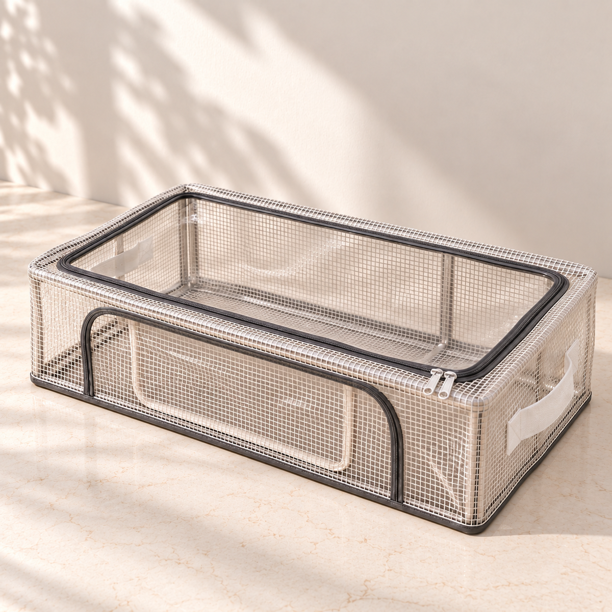 Transparent under-bed storage box with steel frame and zippered top and front openings