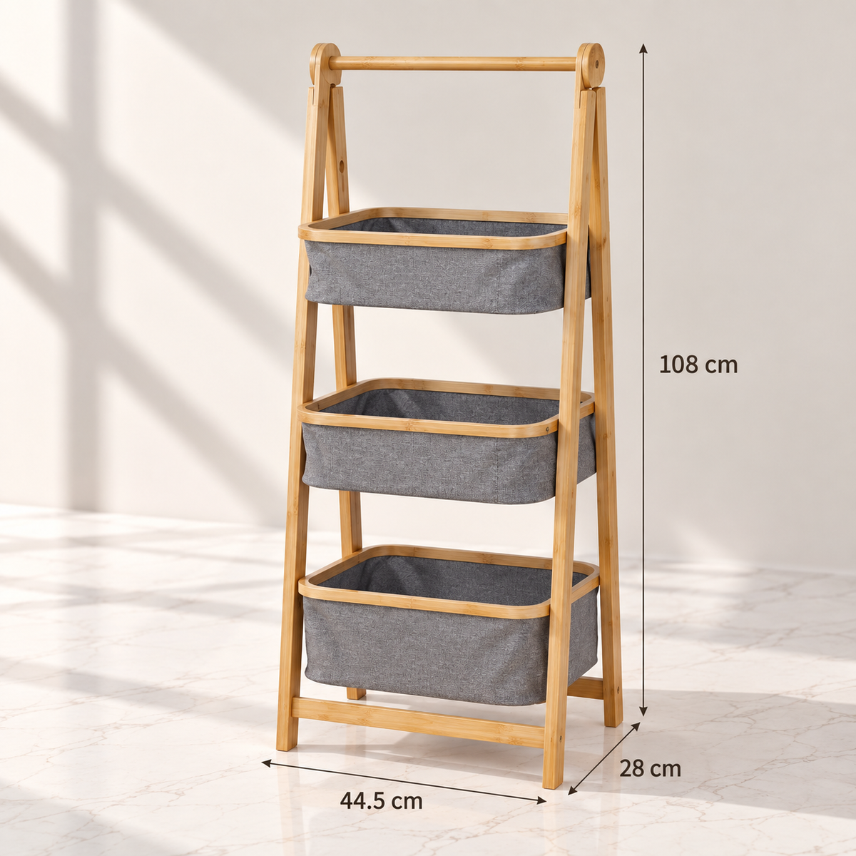 3-tier bamboo laundry sorter with grey fabric baskets, 44.5 × 28 × 108 cm.