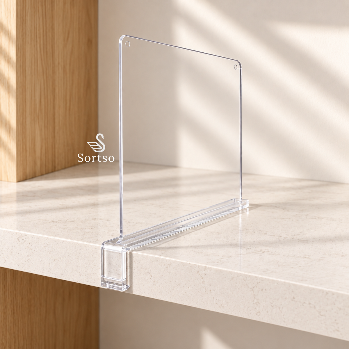 Clear acrylic wardrobe shelf divider clipped onto a shelf
