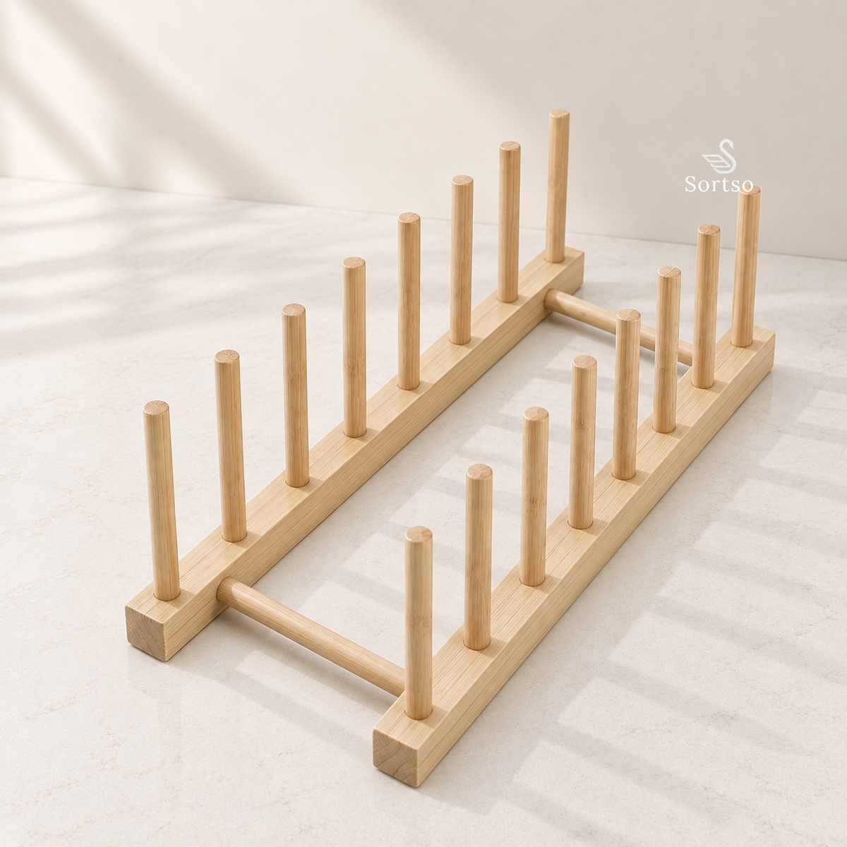 Wooden plate and lid organizer rack with upright dividers for kitchen cabinet storage.