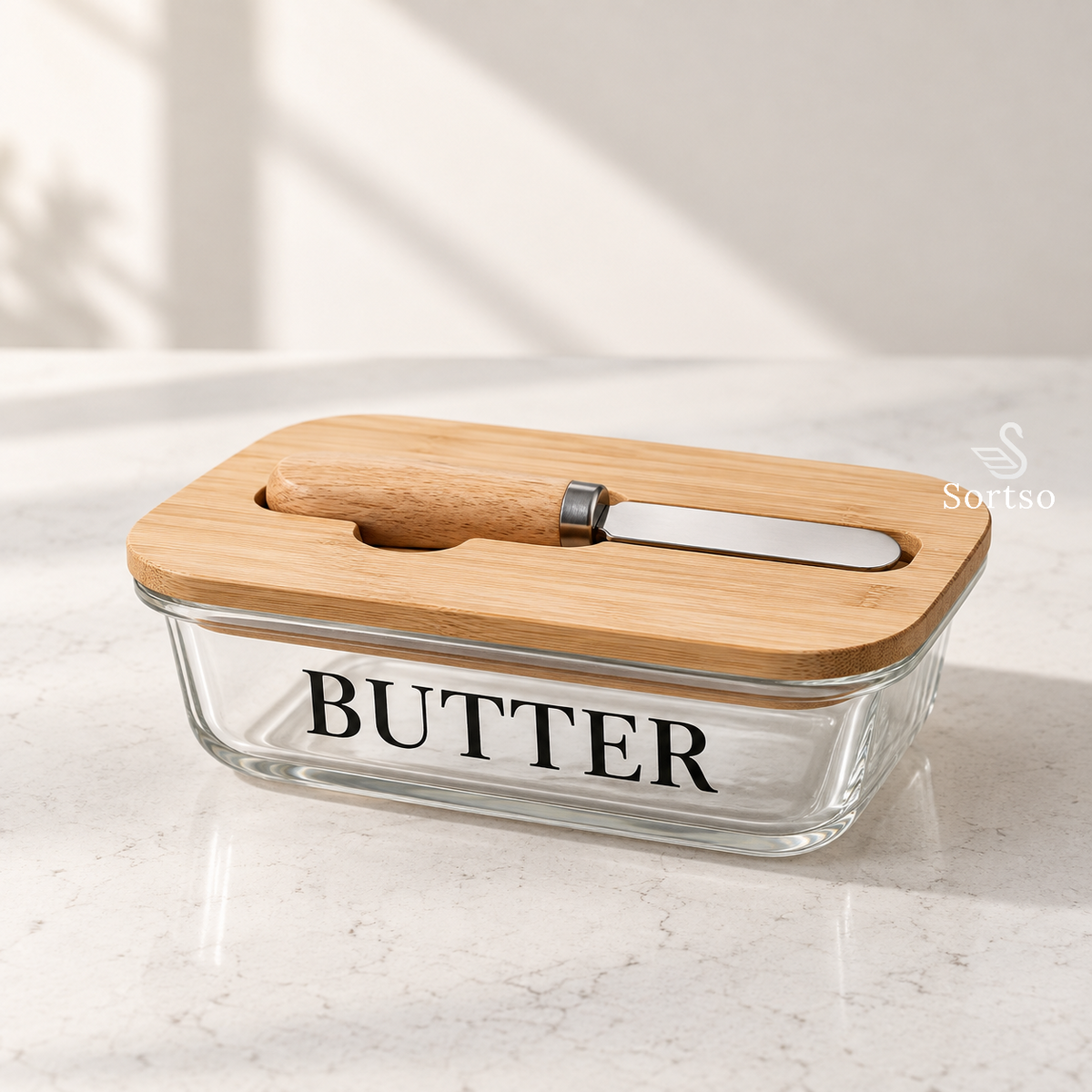 Glass butter keeper with bamboo lid and matching butter knife in built-in slot